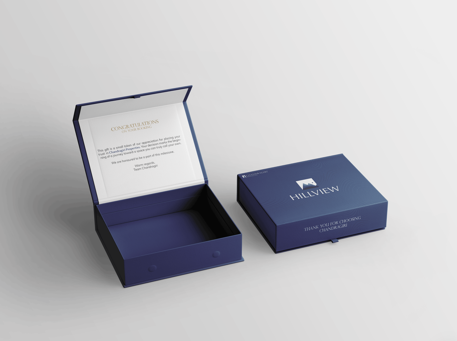 Navy Hillview gift box — open with a thank-you card and closed with the foil logo